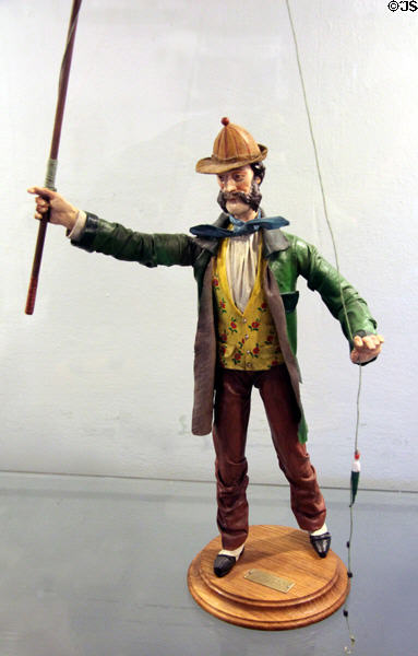 Carved figure of fly fisherman dressed for c1840 at German Hunting & Fishing Museum. Munich, Germany.