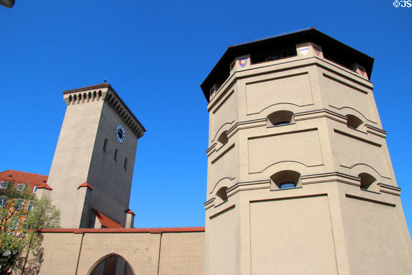 One of two Octagonal towers plus taller clock tower of Isartor city gate. Munich, Germany.
