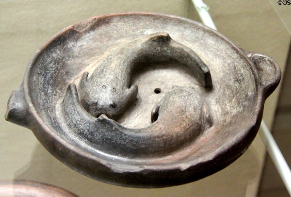 Inca culture ceramic bowl with figures of two catfish (1450-1532 CE) from Cuzco highlands of Peru at Five Continents Museum. Munich, Germany.
