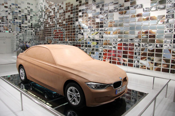 Aerodynamic prototype model in mirrored photomosaic room at BMW Museum. Munich, Germany.