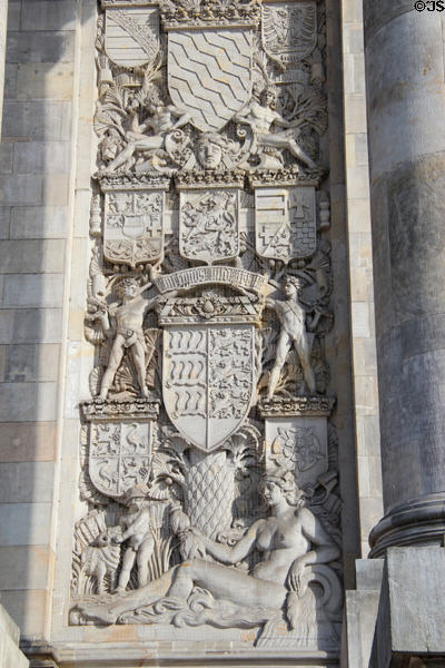 Heraldic reliefs beside doors of German Bundestag. Berlin, Germany.