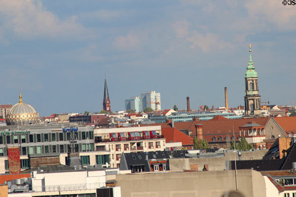 Synagogue with gold dome & Sophien Church with green dome from top of German Bundestag. Berlin, Germany.