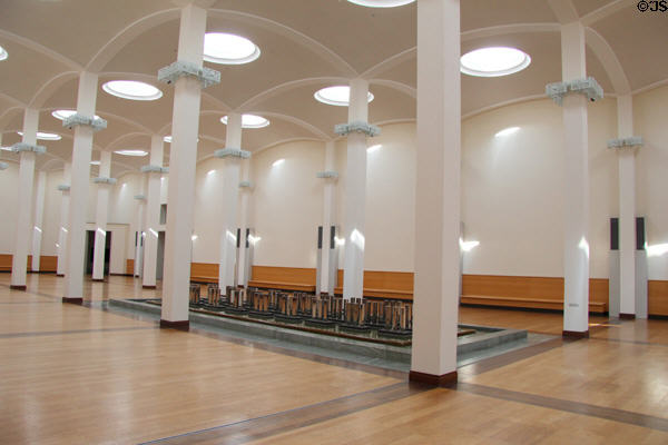 Interior columned hall with skylights & pool-like centerpiece at Berlin Gemaldegalerie. Berlin, Germany.