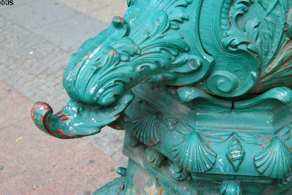 Detail of antique cast iron water pump by Schoening of Berlin on Kurfurstendam. Berlin, Germany.