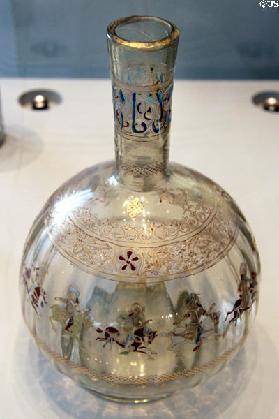 Glass flask decorated with polo riders & arms of a Yemeni ruling house (c1300) from Egypt or Syria at Pergamon Museum. Berlin, Germany.