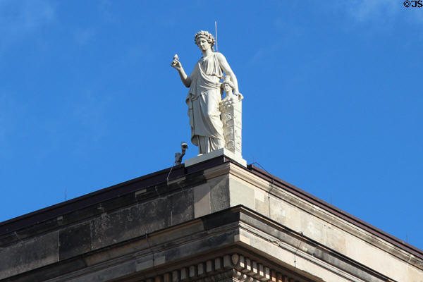 Neoclassical sculpture on corner of Neues Museum. Berlin, Germany.