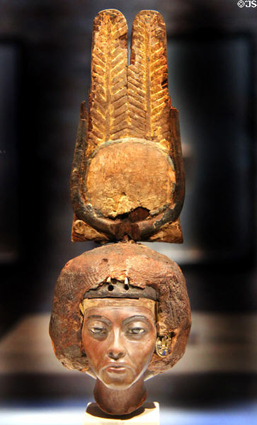 Egyptian carved wood head of queen Tiy with double feather crown decorated with gold, silver, etc. (c1355 BCE) (New Kingdom, 18th Dynasty) from Medinet el-Ghurob at Neues Museum. Berlin, Germany.