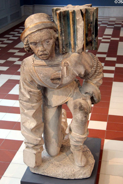 Stooping man pulpit support stone carving (c1490) from Neckar area at Bode Museum. Berlin, Germany.