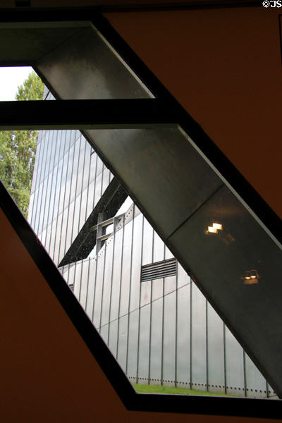 Looking out diagonal window at Jewish Museum Berlin. Berlin, Germany.