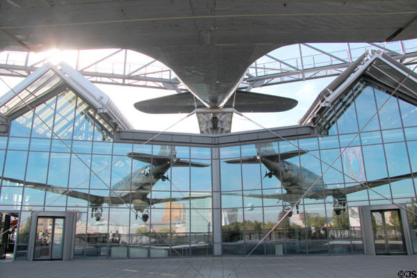 US Air Force Douglas C-47B Skytrain (1945) reflected in window of German Museum of Technology. Berlin, Germany.