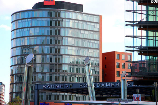 Potsdamer Platz Bahnhof entrance to rail station plus sculptural mirrored columns. Berlin, Germany.
