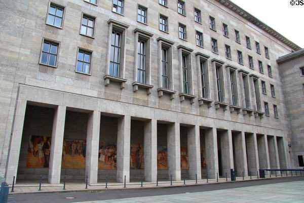 Arcade location of Building the Republic mural by Max Lingner at Detlev Rohwedder. Berlin, Germany.