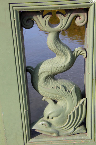 Cast iron railing in form dolphin on Schloss bridge. Berlin, Germany.