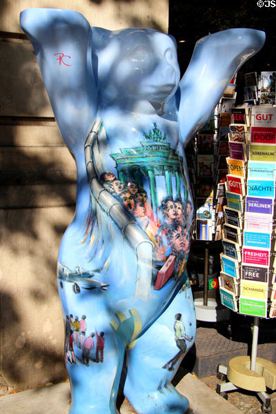 Sidewalk buddys bear painted with Berlin history. Berlin, Germany.
