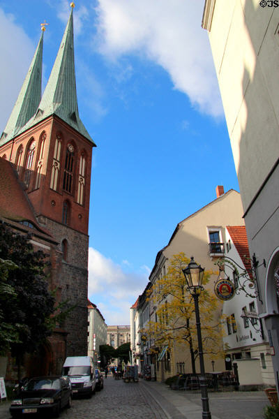Nikolaiverteil streetscape with St Nicholas' Church. Berlin, Germany.