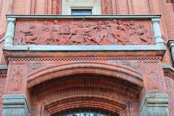 Banquet & dancing frieze on balcony of Rotes Rathaus. Berlin, Germany.