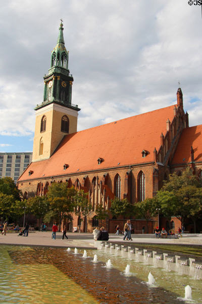 St Mary's Church over plaza fountain. Berlin, Germany.