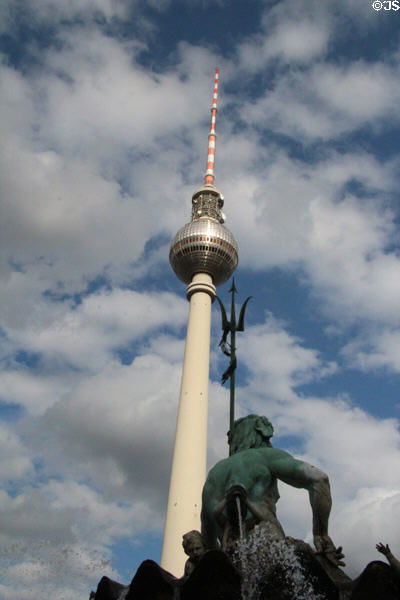 Berlin Television Tower over Neptune Fountain. Berlin, Germany.