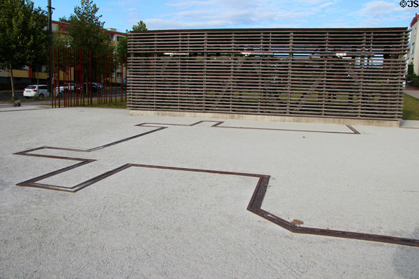 Bernauer Straße Berlin Wall Memorial marks destroyed buildings in outlines on ground. Berlin, Germany.
