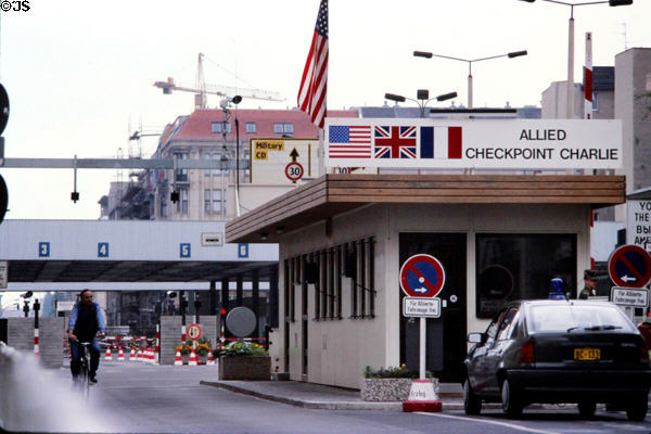 Checkpoint Charlie with empty East German inspection lines beyond. Berlin, Germany.