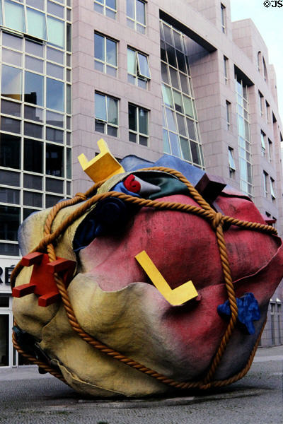 Sculpted ball of cloth tied with rope & chairs on Bethlehem Church place. Berlin, Germany.