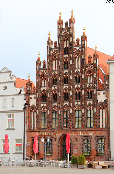 Stepped brick Gothic commercial building on Market square. Greifswald, Germany.