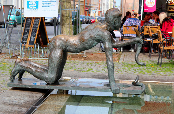 Fischerbrunnen Fischmarkt fountain statues. Greifswald, Germany.