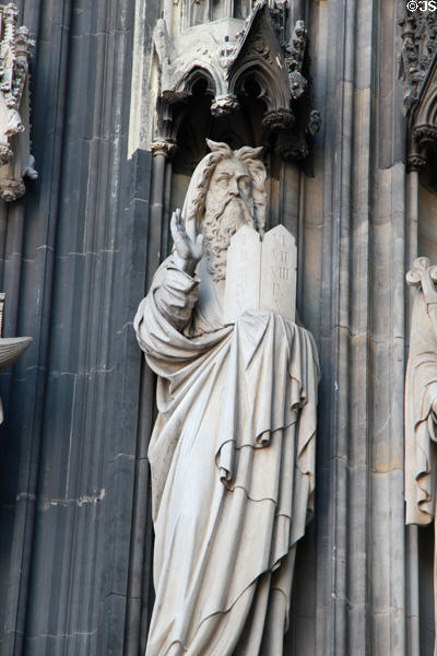 Figure of Moses beside west entrance doors to Köln Cathedral. Köln, Germany.