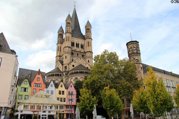 Towers of Great St Martin church (1150-1250, restored 1985) with Fischmarkt area in foreground. Köln, Germany.