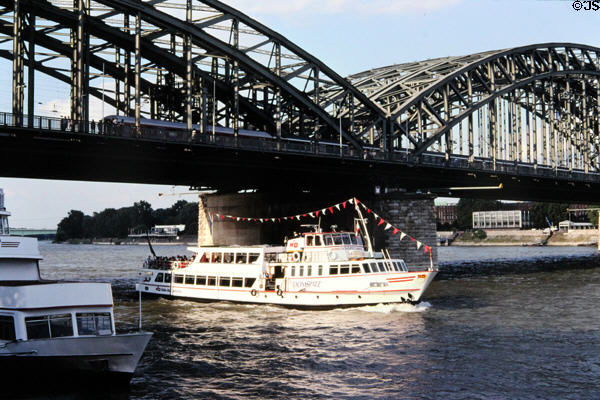 Tour boats under Hohenzollern Bridge. Köln, Germany.