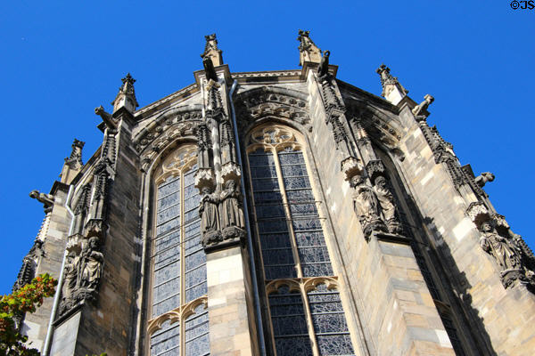 Stained glass windows with tracery & carvings on Aachen Cathedral. Aachen, Germany.