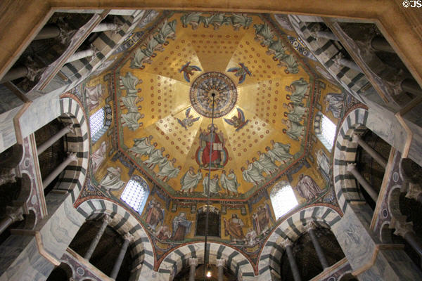Mosaic ceiling with Christ enthroned, symbols of the four Evangelists & Elders from Apocalypse of John offering their crowns to Christ under dome of Palatine Chapel at Aachen Cathedral (original c800, redone 1880). Aachen, Germany.