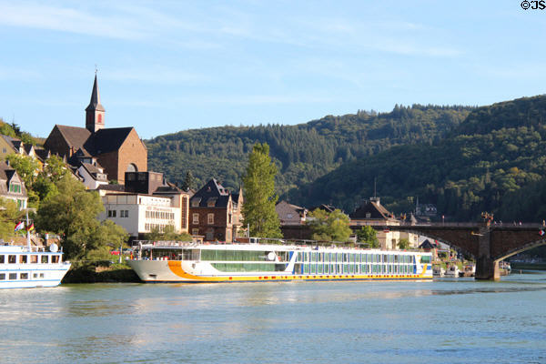 Cruise boat docked at Skagerrak Bridge on Cond side of Mosel River. Cochem, Germany.