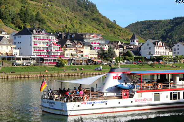 Sightseeing boat traveling past Cochem. Cochem, Germany.