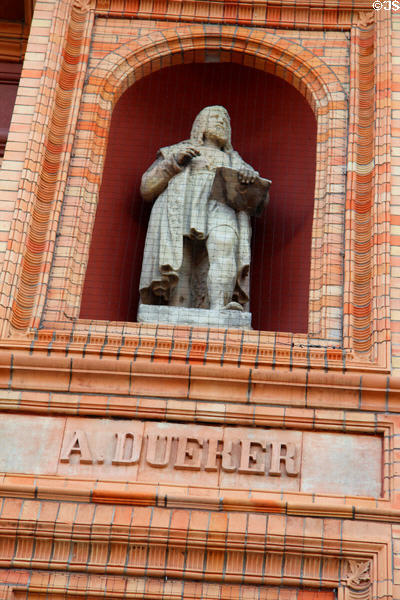 Statue of Albrecht Dürer, German painter, in niche of original brick building at Hamburg Fine Arts Museum. Hamburg, Germany.