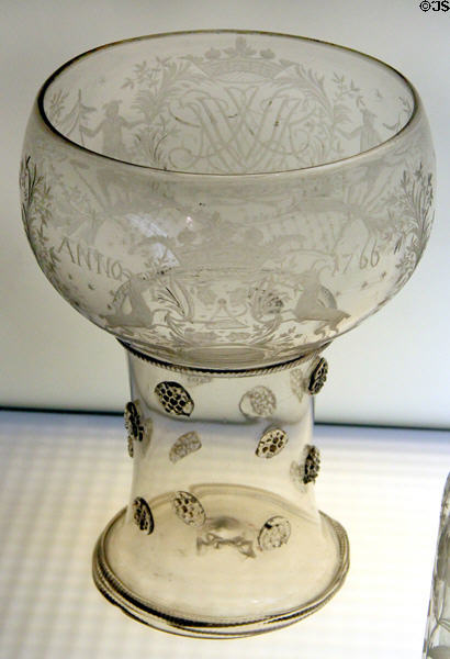 Römer footed drinking glass with coat of arms monogram (1766) from Nuremburg? at Hamburg Decorative Arts Museum. Hamburg, Germany.