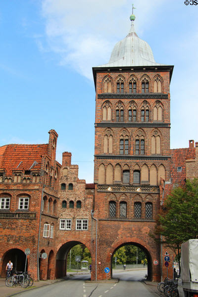 Burgtor (1444) with Baroque cap-like roof (1685) which replaced original & widened arched passage from 1850 & 1928. Lübeck, Germany.