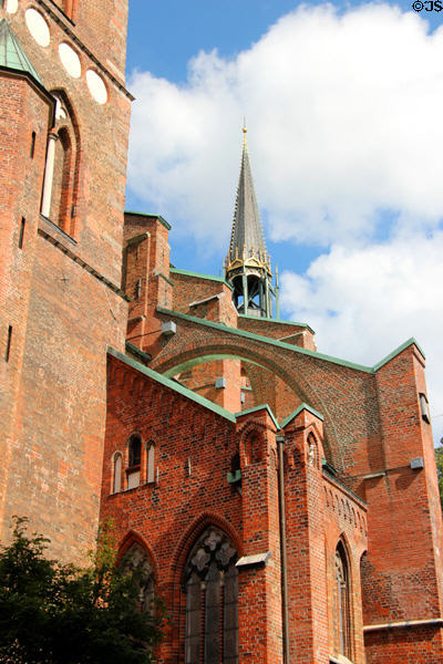 Flamboyant central spire & brick flying buttresses of St Mary's Church. Lübeck, Germany.