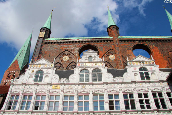 Details of Renaissance arcade (1570-2) by Hans Fleminck & Herkules Midow below Gothic shield wall at Lübeck Rathaus. Lübeck, Germany.