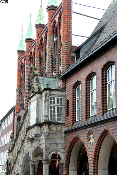 Gothic shield wall above Renaissance staircase at Lübeck Rathaus. Lübeck, Germany.