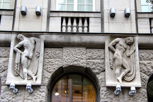 Details of carved figure reliefs on Kröpeliner Str. 84. Rostock, Germany.