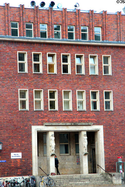 House of Unions (Haus der Gewerkchaften) (on Alter Markt) with socialist realist sculptures. Stralsund, Germany.