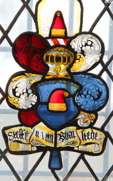 Stained glass window with family arms at Gottorf Palace. Schleswig, Germany.