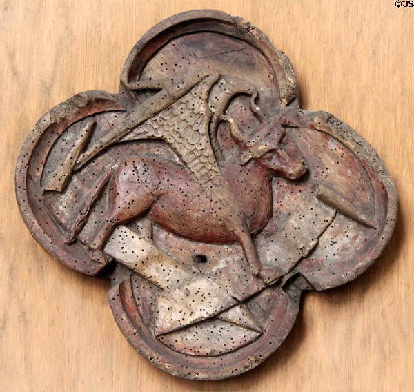 Winged bull of evangelist Luke in quatrefoil linden wood carving (late 15thC) at Schleswig Holstein State Museum. Schleswig, Germany.