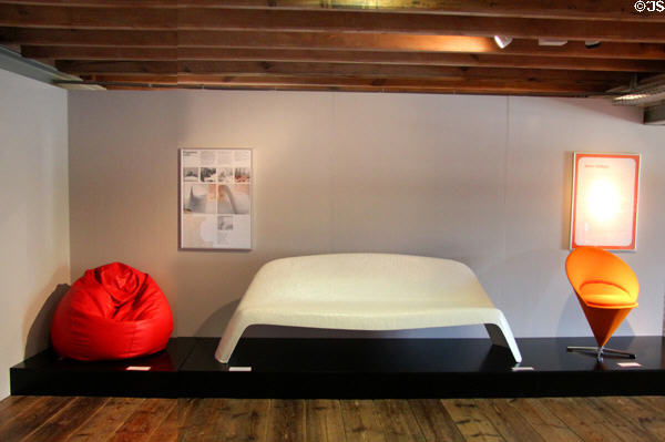 Modern 'Sacco' beanbag chair (1968) by Pierro Gatti, Cesare Paolini & Franco Teodore; plastic garden bench (1961) by Walter Papst; & Cone Chair (1958) by Verner Panton at Schleswig Holstein State Museum. Schleswig, Germany.