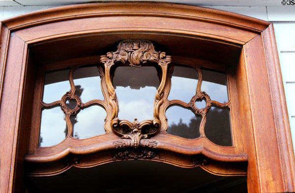 Baroque doorway light typical of the town. Monschau, Germany.