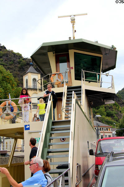 Passengers on car ferry between St. Goarshausen & St. Goar. St. Goar, Germany.