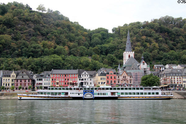 Sightseeing boat traveling past St. Goar. St. Goar, Germany.