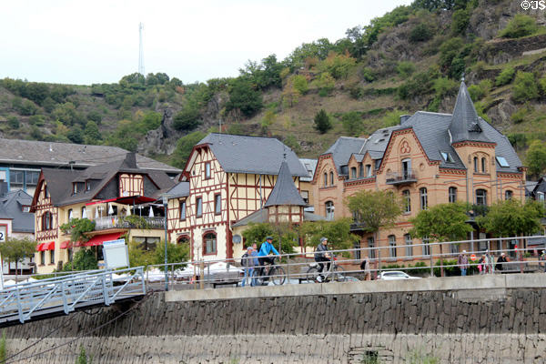 Bicyclists on riverside promenade at St. Goar. St. Goar, Germany.
