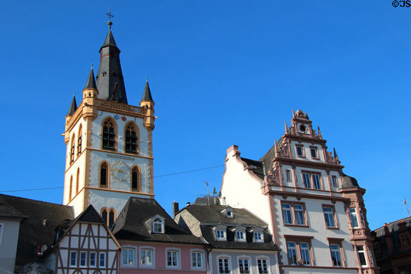 Tower of St Gangolf Church & upper story's of buildings on Hauptmarkt. Trier, Germany.